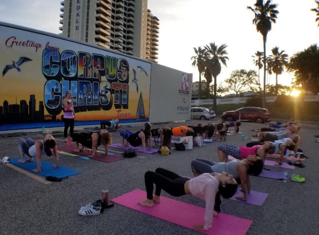 Water Dog yoga in downtown Corpus Christi